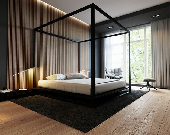 lit baldaquin en acier avec tête de lit en bois dans une ambiance moderne industrielle