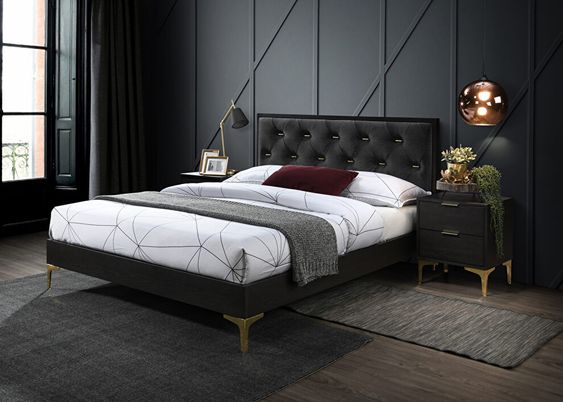 lit et mobilier noirs avec des pieds dorés pour une déco chambre moderne