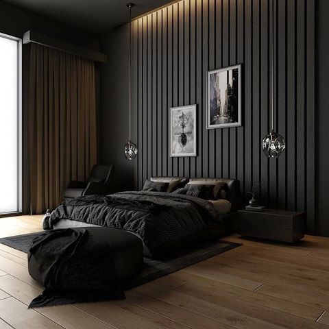 mur en lattes de bois peintes en noir et linge de lit sombre pour créer une déco chambre moderne