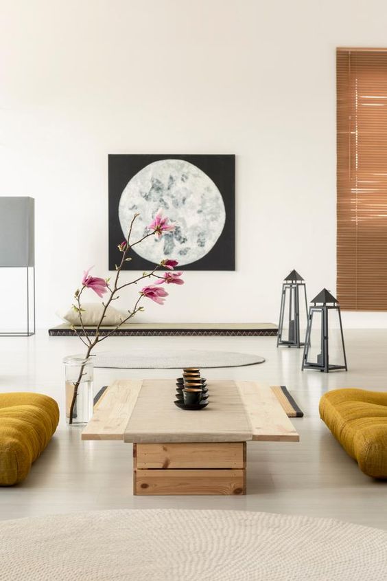 salon japonais minimaliste avec table design en bois et tapis ronds