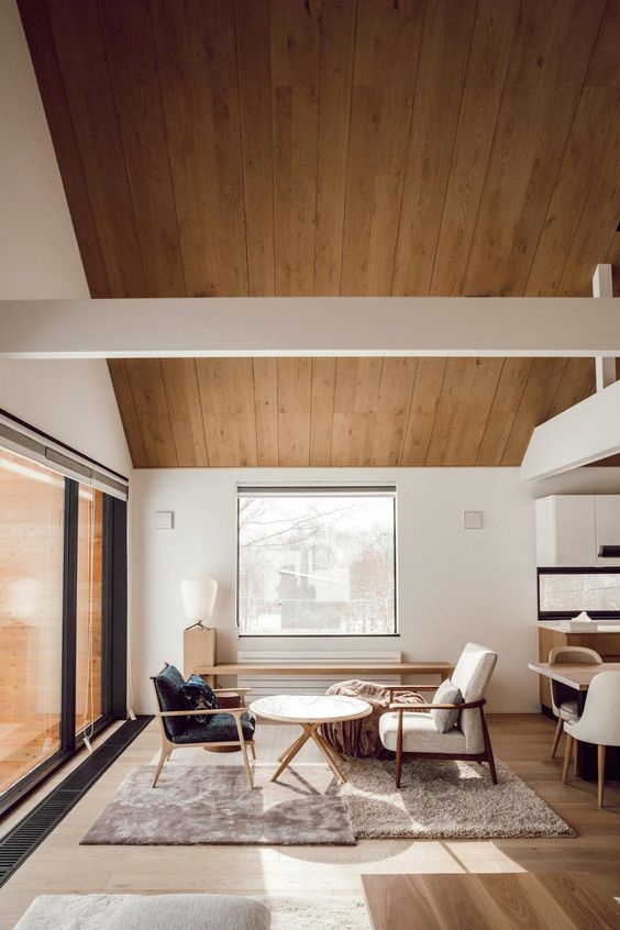 déco d'ailleurs minimaliste pour ce salon au style japandi avec mobilier rétro en bois