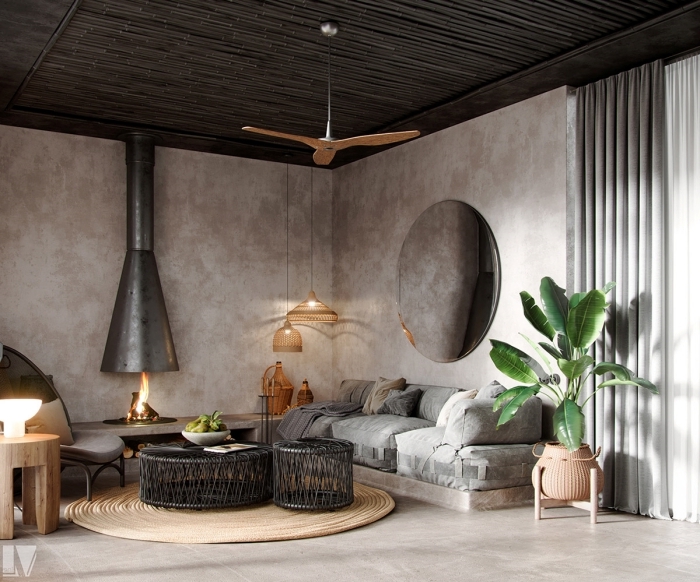 Un salon de style contemporain avec des murs effet béton et une table basse en osier