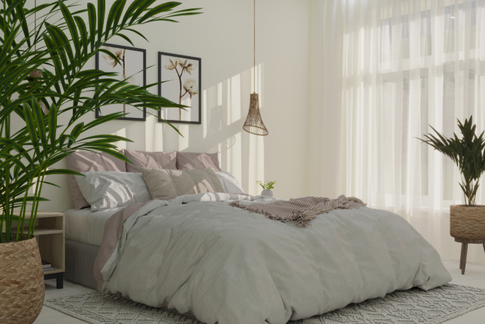 Décoration d'une chambre zen et naturelle avec couleurs neutres, suspensions tissées, cadre floral et plantes vertes.