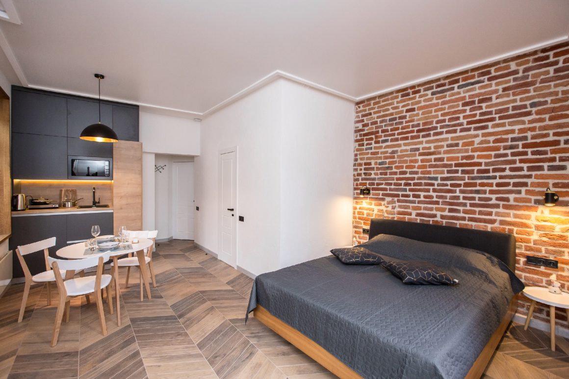 idée pour aménager un studio avec un cuisine ouverte, salle à manger et coint nuit.