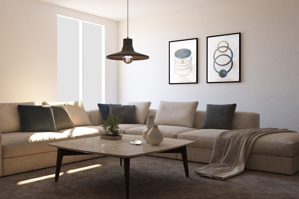 Canapé salon beige avec des coussins gris, une table basse et une déco minimaliste.
