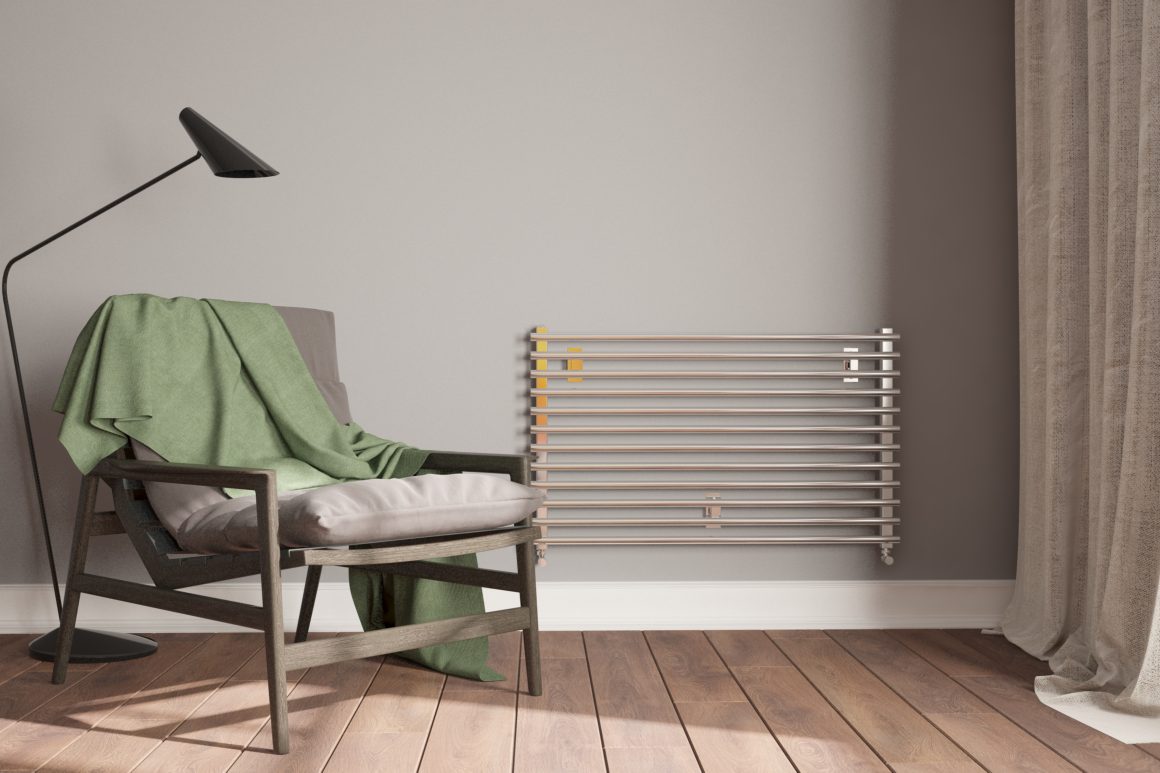 Radiateur électrique dans un espace minimaliste incluant fauteuil et lampadaire.