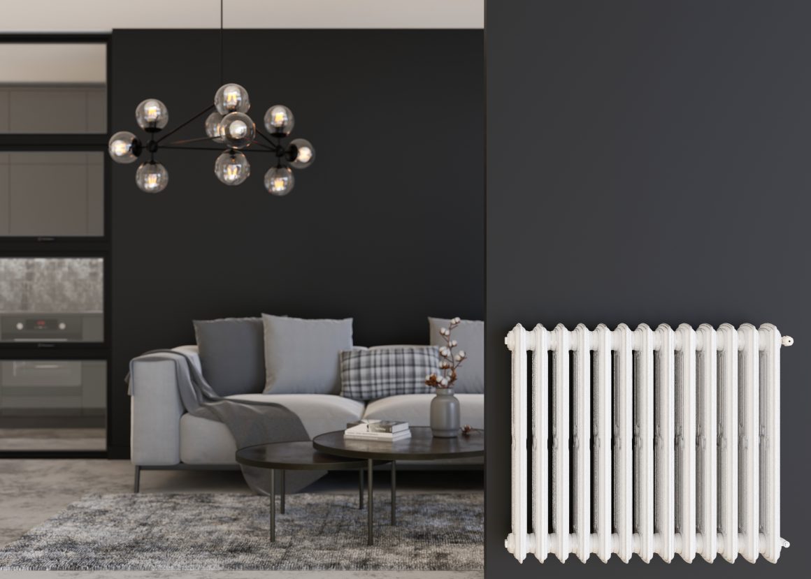 Un radiateur électrique mural blanc installé dans un salon moderne incluant canapé gris, table basse et luminaire suspendu.