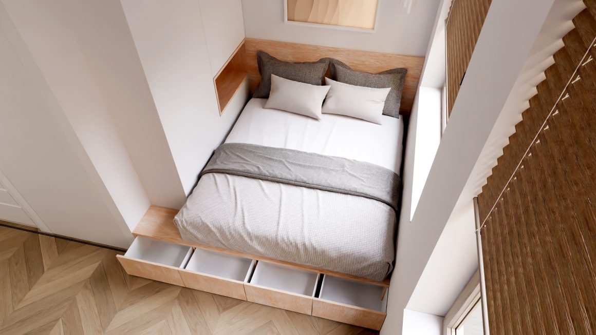 Petite chambre avec lit incluant des rangements intégrés.
