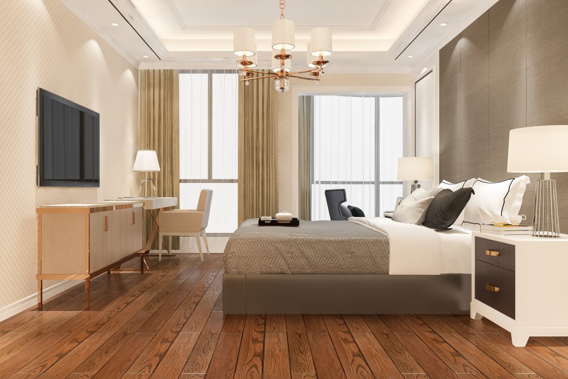 Déco chambre luxe aux tons neutres avec éclairage chaleureux, rideaux légers et accessoires minimalistes
