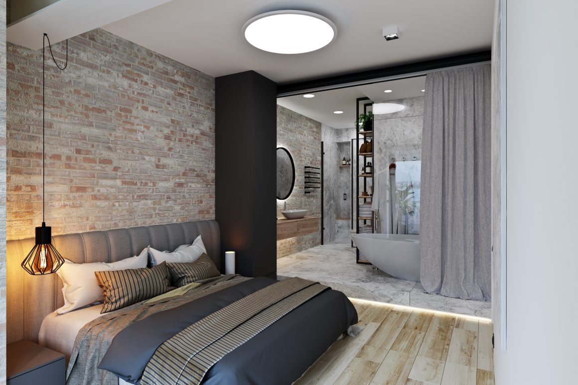 Chambre urbaine incluant lit avec tête capitonnée, suspension et salle de bains ouverte avec rideaux gris