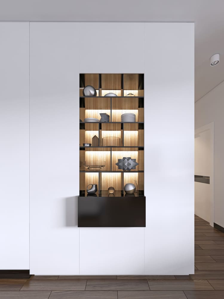 une bibliothèque étagère moderne noire intégrée dans le mur