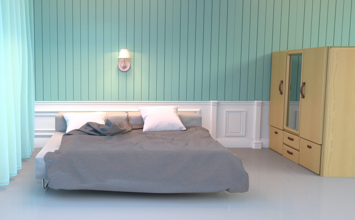 le mur derriere la tete du lit est peint en vert claire donnant sensation de serenite