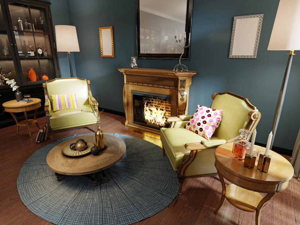 des fauteuils de style Voltaire avec une cheminée ancienne, et un tapis et une table basse moderne