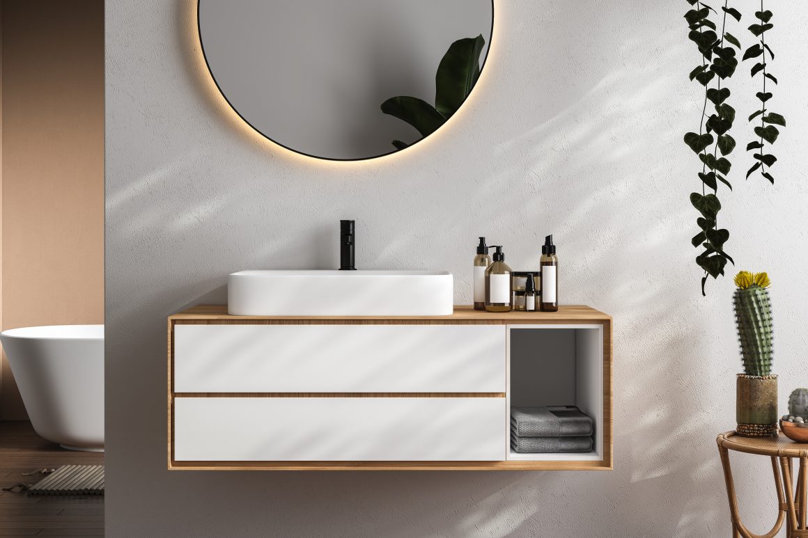 Tendance meuble salle de bain flottant en bois et blanc avec vasque rectangulaire et miroir rond