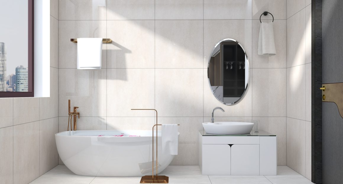 Baignoire îlot épurée avec carrelage mural grand format aux tons sable, lavabo et miroir