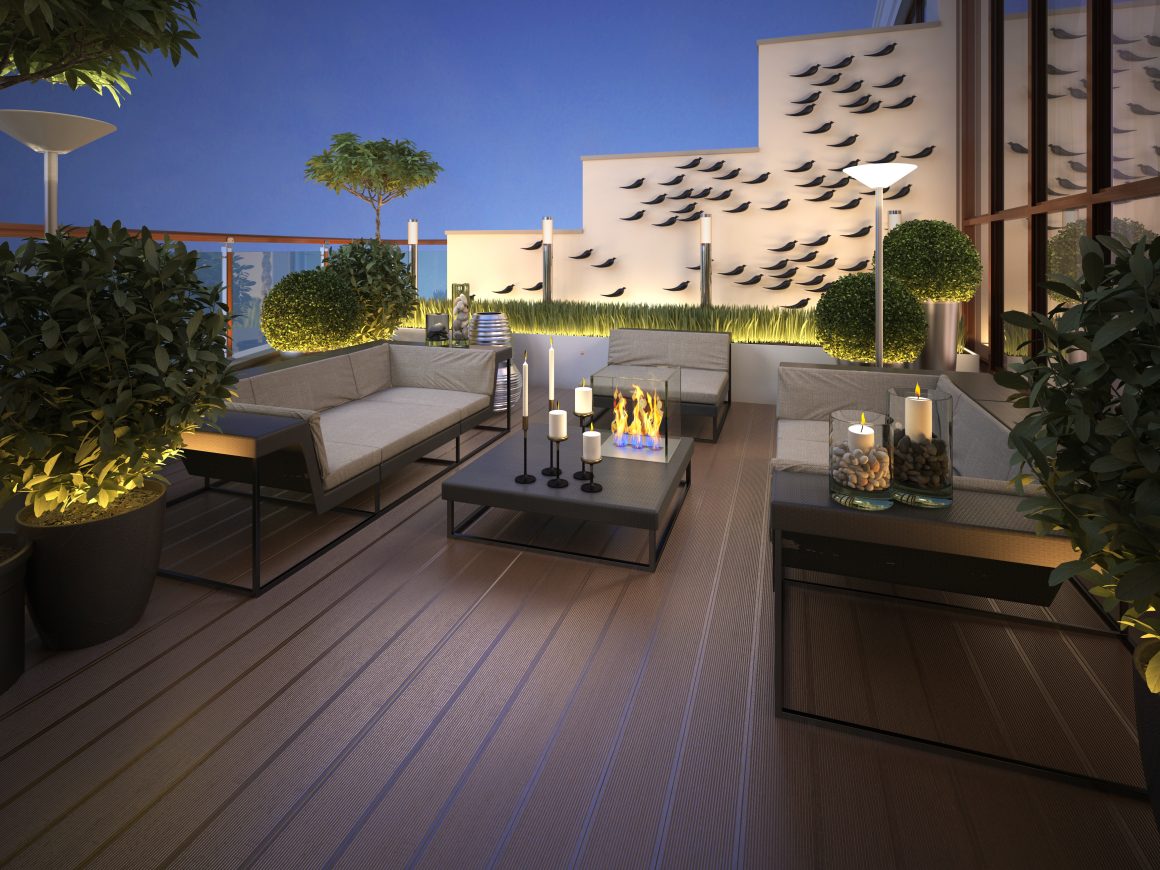 Aménagement toiture terrasse avec mobilier en métal noir, cheminée centrale, bougies et plantes