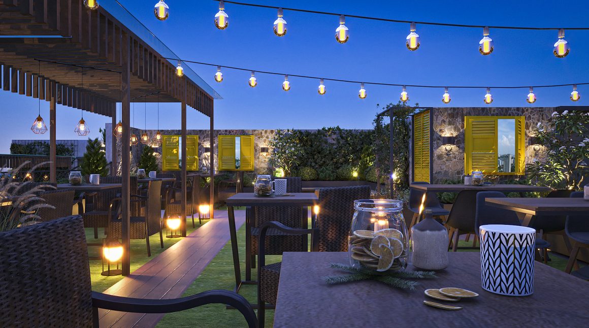 Toit-terrasse : décor convivial avec touches jaunes, guirlandes lumineuses, bougies, tables et chaises tressées