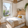 Petite chambre meublée avec bureau compact, chaise, lit avec rangement et étagères murales