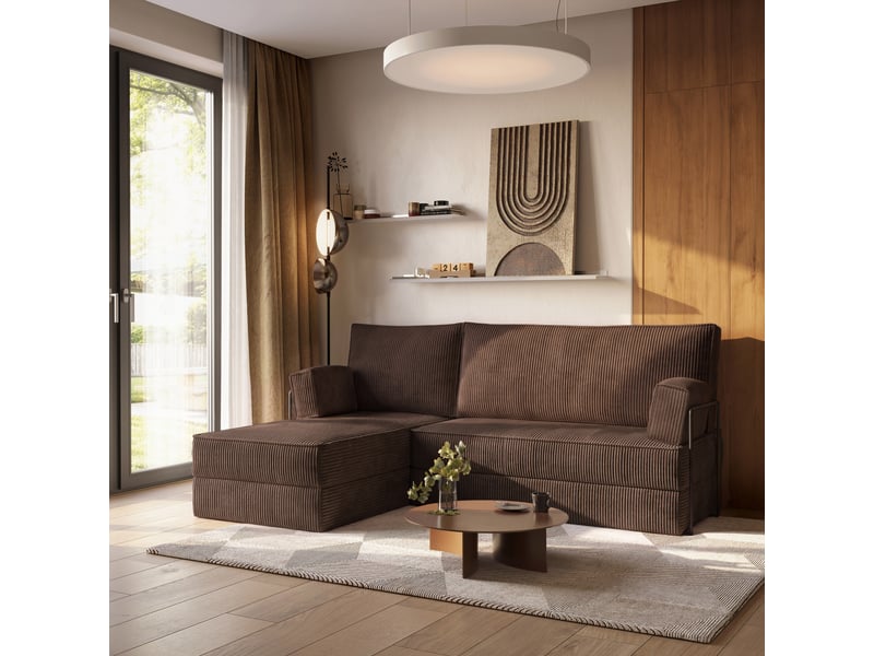 Canapé d'angle côtelé brun avec table basse ronde, tapis géométrique et décor mural minimaliste